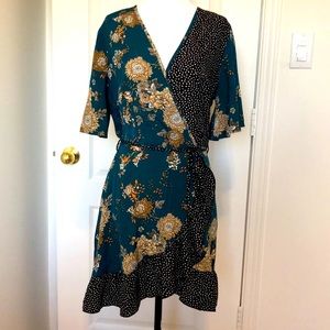 Faux wrap dress with floral and polka dot pattern